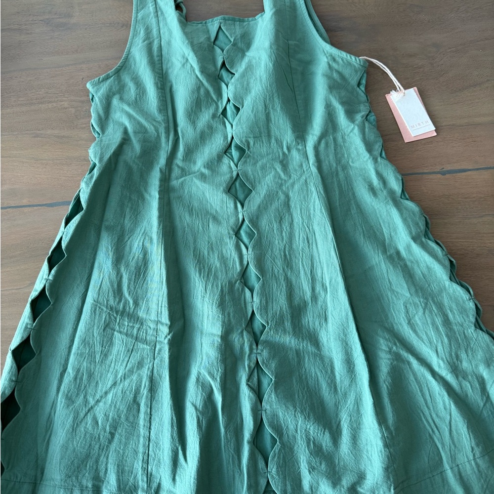 Mirth Green Sleeveless Dress with Unique Cutout Design